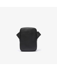 Lacoste Bandolera vertical de piel con monograma estampado