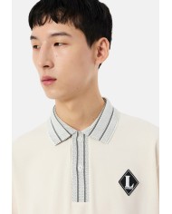 Lacoste Polo de corte clásico con insigniA