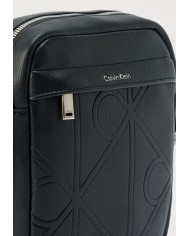 Calvin Klein Bandolera Emblem AOP Emboss Reporter