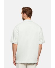 Hugo Boss Polo Doniee oversize fit de algodón con logo tonal